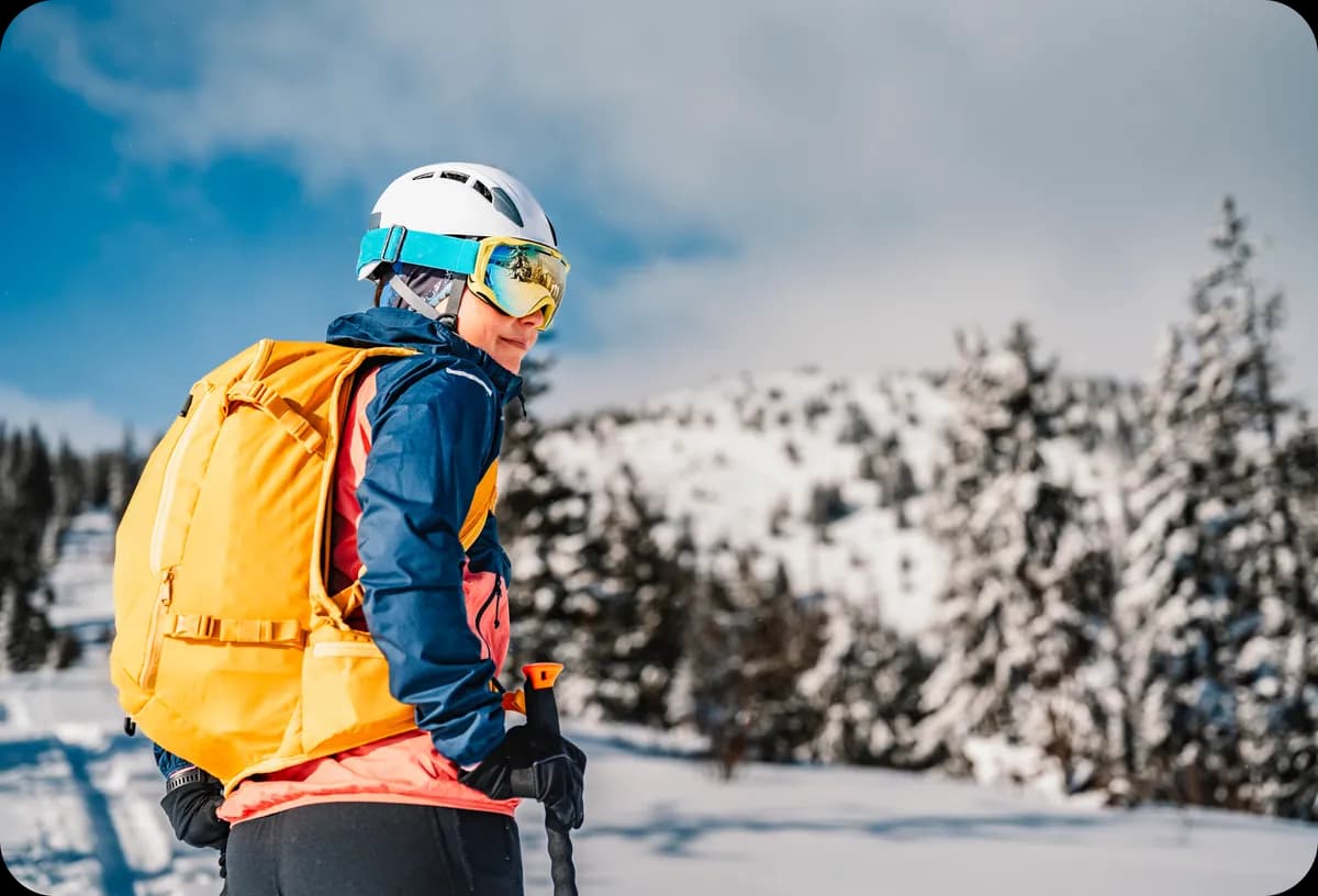 Winter skier with backpack