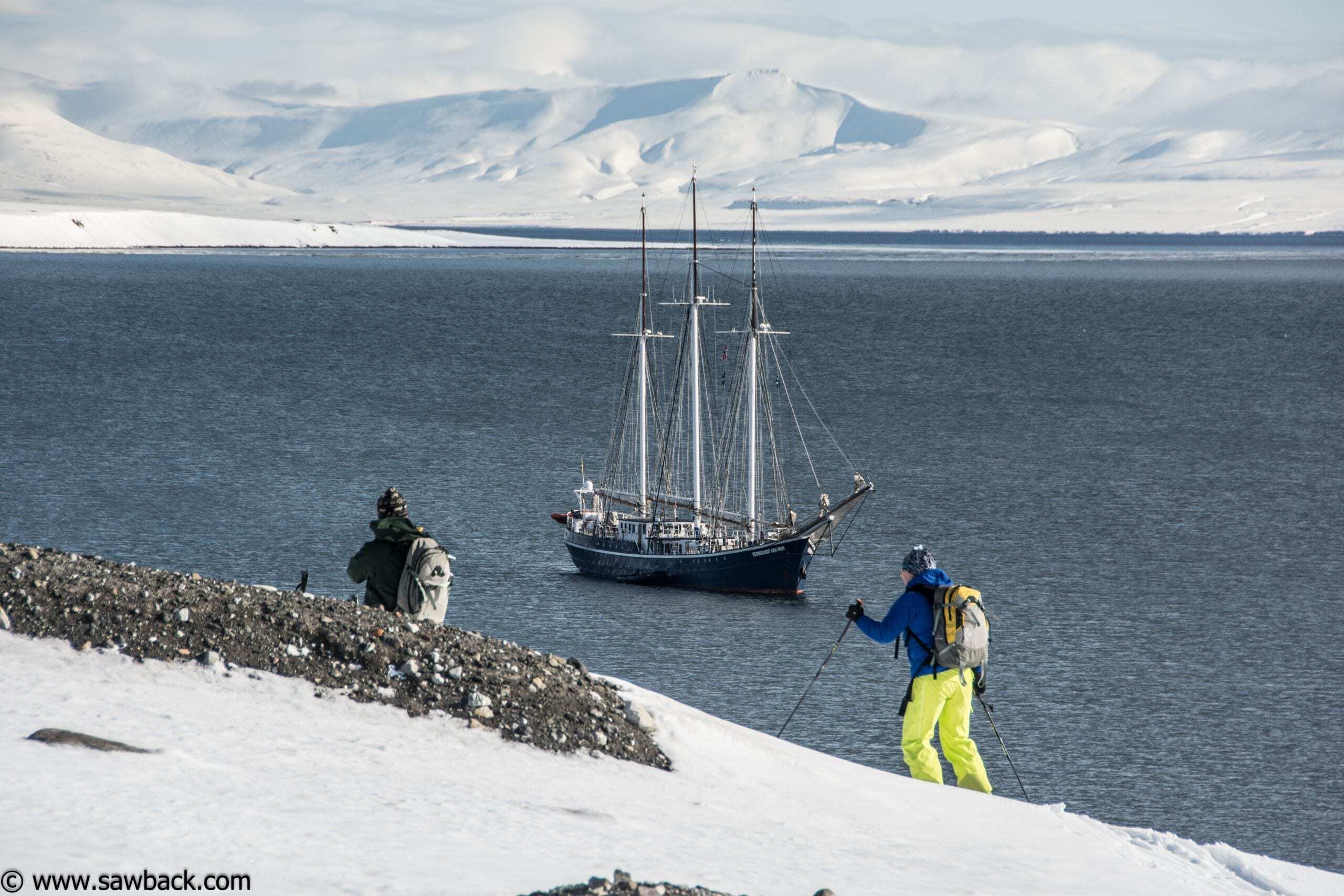 Skiing back down to the sailboat at the end of a day of ski touring on Svalbard